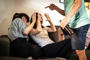 Drunken father threatening his family,bad habit,behavior from alcohol dependency,physical abuse